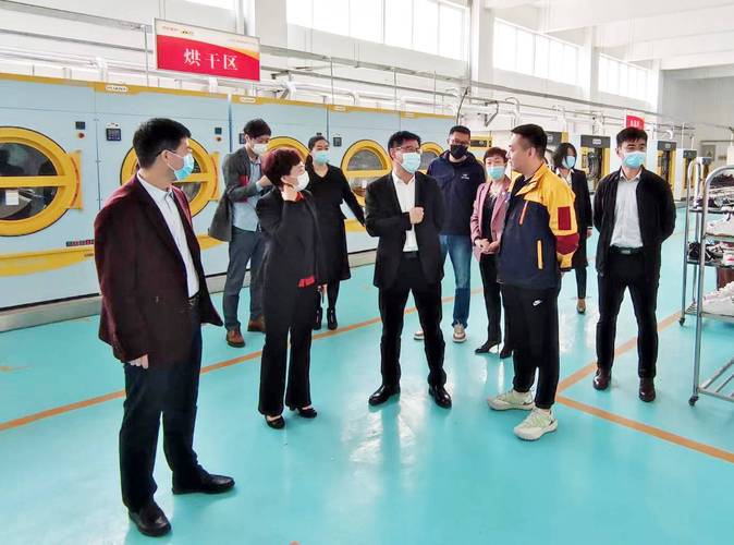 山东工商学院党委副书记杨同毅一行莅临浣洗烟台5g智慧洗护工厂参观